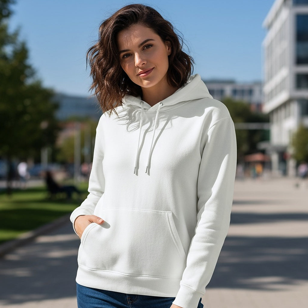 The hoodie worn in the city, hand resting in the low front pocket