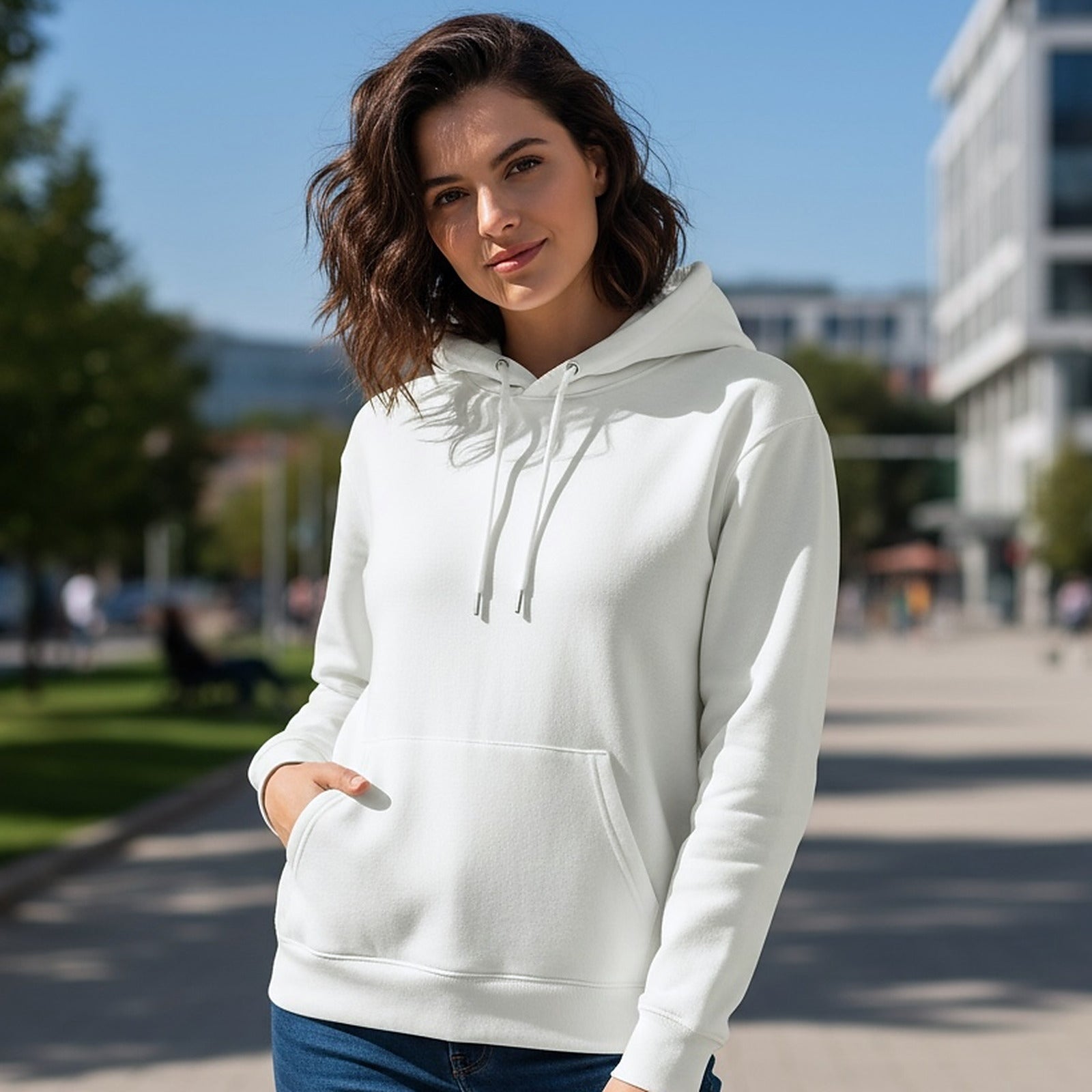 The hoodie worn in the city, hand resting in the low front pocket